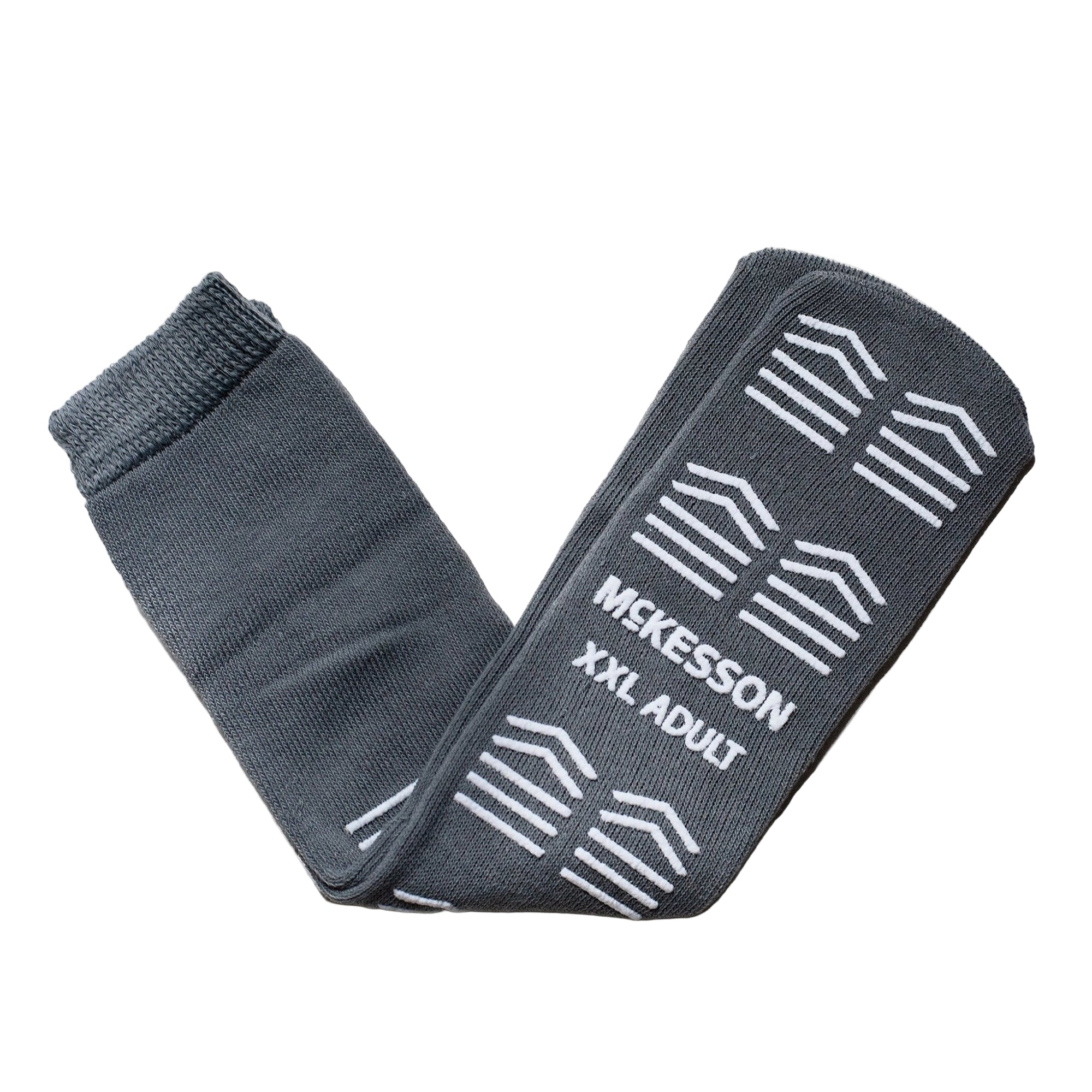 McKesson Adult XXL Slipper Socks in gray with full-sole safety tread for slip resistance. Soft, breathable polyester knit and elastic cuff for secure, comfortable fit—perfect for home or healthcare settings.