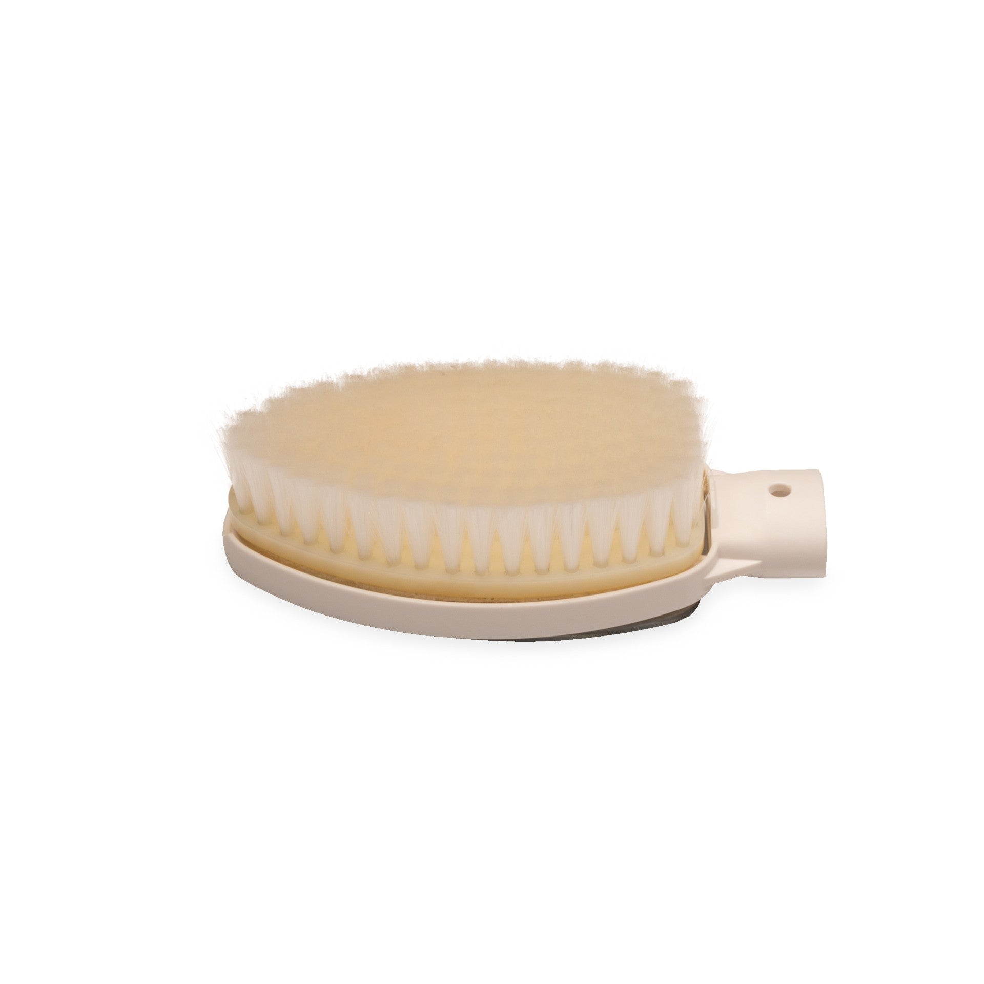 Beige body brush with a white handle on a white background